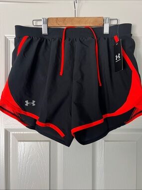 Under Armour Black Shorts with Bright Red trim - comes in Med. And small